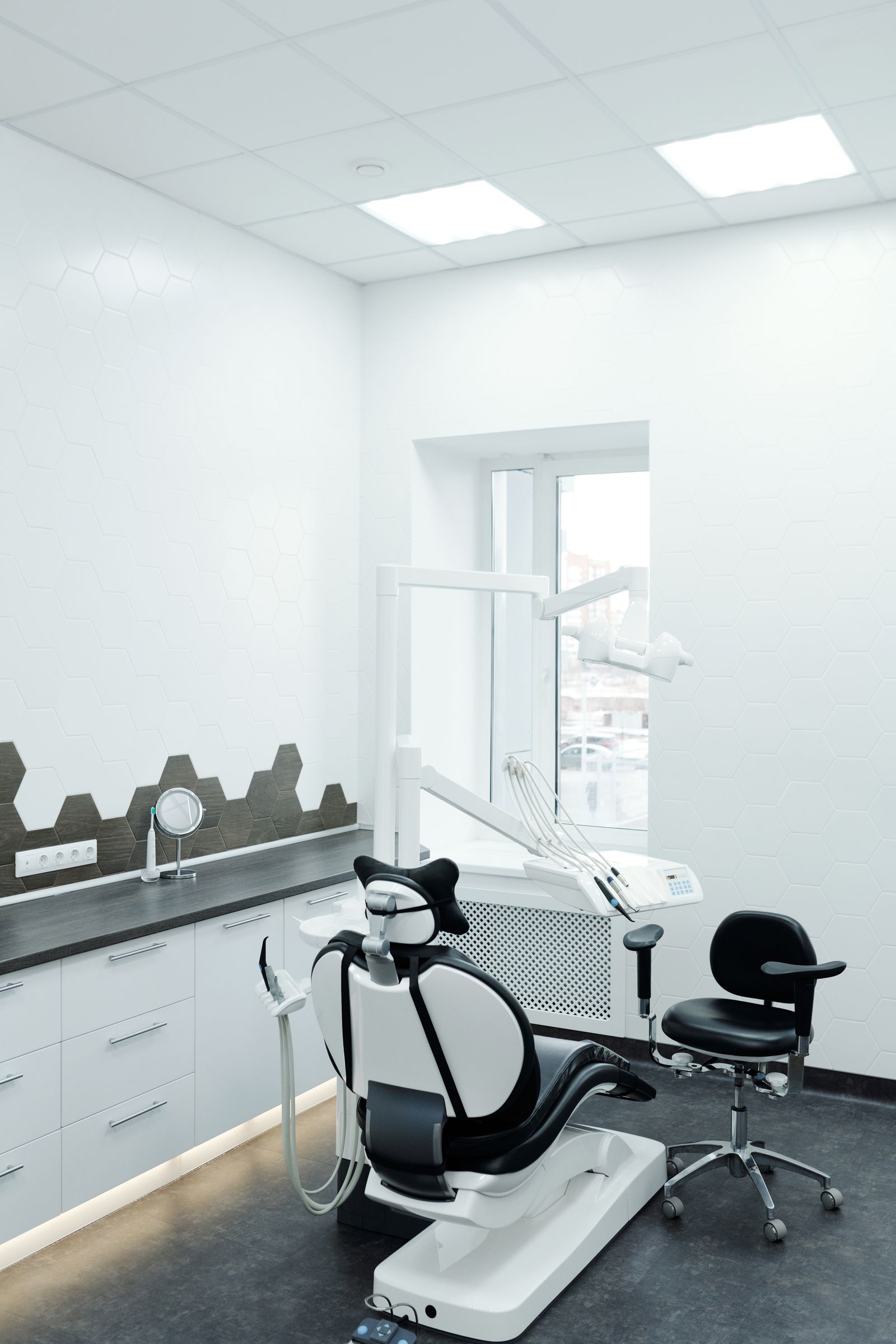 A clean, white modern dental operatory with the latest equipment