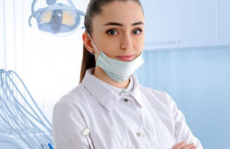 A dental assistant in a modern operatory